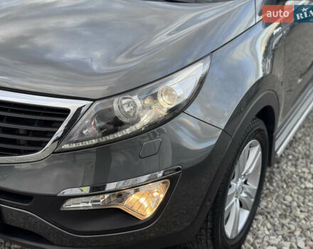 Коричневий Кіа Sportage, об'ємом двигуна 2 л та пробігом 190 тис. км за 13950 $, фото 26 на Automoto.ua