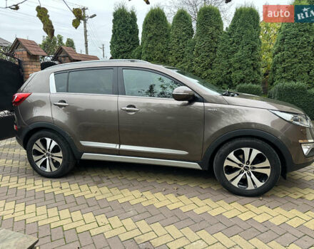 Коричневий Кіа Sportage, об'ємом двигуна 2 л та пробігом 197 тис. км за 14800 $, фото 2 на Automoto.ua
