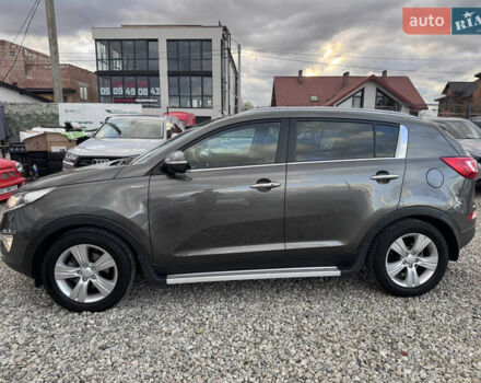 Коричневий Кіа Sportage, об'ємом двигуна 2 л та пробігом 190 тис. км за 13950 $, фото 5 на Automoto.ua