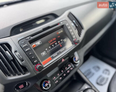 Коричневий Кіа Sportage, об'ємом двигуна 2 л та пробігом 190 тис. км за 13950 $, фото 35 на Automoto.ua