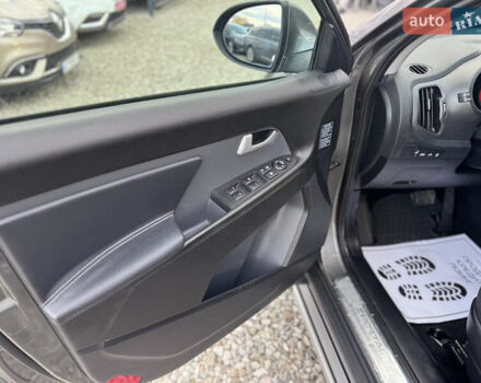 Коричневий Кіа Sportage, об'ємом двигуна 2 л та пробігом 190 тис. км за 13950 $, фото 31 на Automoto.ua