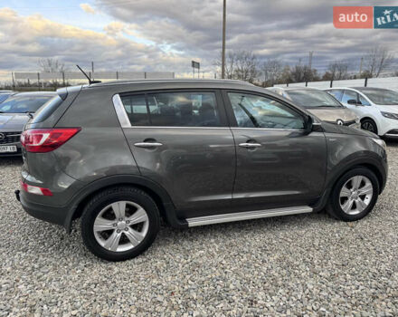 Коричневий Кіа Sportage, об'ємом двигуна 2 л та пробігом 190 тис. км за 13950 $, фото 20 на Automoto.ua