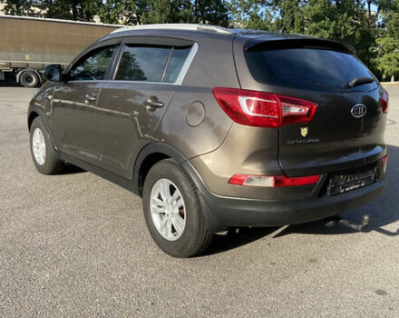 Коричневий Кіа Sportage, об'ємом двигуна 2 л та пробігом 173 тис. км за 11666 $, фото 2 на Automoto.ua