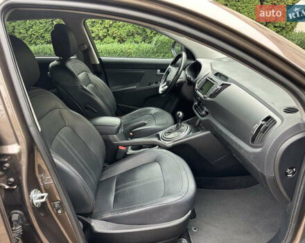 Коричневий Кіа Sportage, об'ємом двигуна 2 л та пробігом 197 тис. км за 14800 $, фото 16 на Automoto.ua