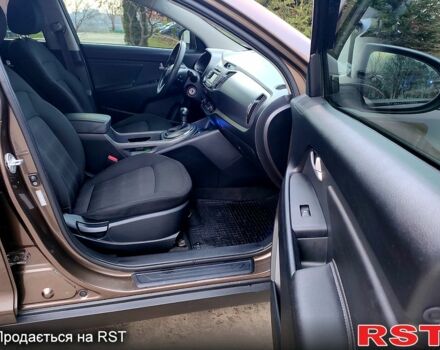 Коричневий Кіа Sportage, об'ємом двигуна 2.4 л та пробігом 160 тис. км за 11650 $, фото 4 на Automoto.ua