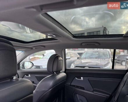 Коричневий Кіа Sportage, об'ємом двигуна 2 л та пробігом 190 тис. км за 13950 $, фото 52 на Automoto.ua