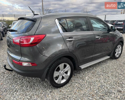 Коричневий Кіа Sportage, об'ємом двигуна 2 л та пробігом 190 тис. км за 13950 $, фото 19 на Automoto.ua