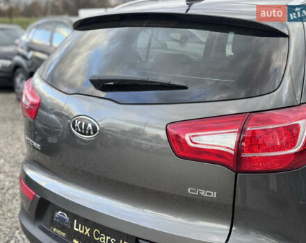 Коричневий Кіа Sportage, об'ємом двигуна 2 л та пробігом 190 тис. км за 13950 $, фото 17 на Automoto.ua