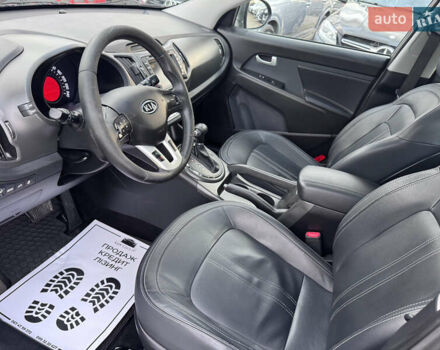 Коричневий Кіа Sportage, об'ємом двигуна 2 л та пробігом 190 тис. км за 13950 $, фото 45 на Automoto.ua