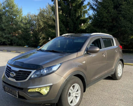 Коричневий Кіа Sportage, об'ємом двигуна 2 л та пробігом 173 тис. км за 11666 $, фото 1 на Automoto.ua