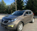Коричневий Кіа Sportage, об'ємом двигуна 2 л та пробігом 173 тис. км за 11666 $, фото 1 на Automoto.ua