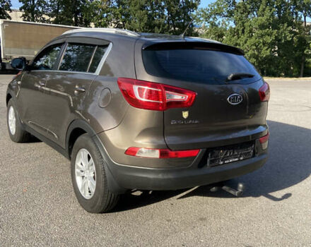 Коричневий Кіа Sportage, об'ємом двигуна 2 л та пробігом 173 тис. км за 11666 $, фото 3 на Automoto.ua