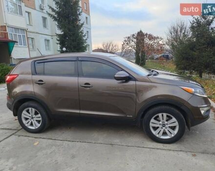 Коричневый Киа Sportage, объемом двигателя 2.4 л и пробегом 164 тыс. км за 11750 $, фото 1 на Automoto.ua