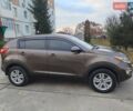 Коричневый Киа Sportage, объемом двигателя 2.4 л и пробегом 164 тыс. км за 11750 $, фото 1 на Automoto.ua