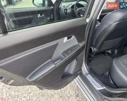 Коричневий Кіа Sportage, об'ємом двигуна 2 л та пробігом 190 тис. км за 13950 $, фото 46 на Automoto.ua