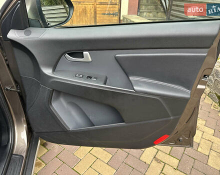 Коричневий Кіа Sportage, об'ємом двигуна 2 л та пробігом 197 тис. км за 14800 $, фото 22 на Automoto.ua