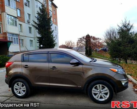 Коричневий Кіа Sportage, об'ємом двигуна 2.4 л та пробігом 160 тис. км за 11650 $, фото 13 на Automoto.ua