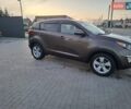 Коричневый Киа Sportage, объемом двигателя 2.4 л и пробегом 105 тыс. км за 11500 $, фото 1 на Automoto.ua