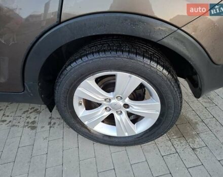 Коричневый Киа Sportage, объемом двигателя 2.4 л и пробегом 105 тыс. км за 11500 $, фото 11 на Automoto.ua