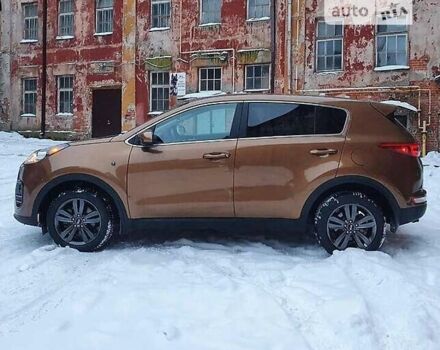 Коричневый Киа Sportage, объемом двигателя 2.36 л и пробегом 77 тыс. км за 15700 $, фото 1 на Automoto.ua