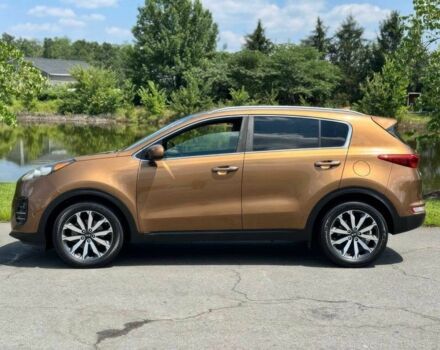 Коричневый Киа Sportage, объемом двигателя 2.4 л и пробегом 79 тыс. км за 5800 $, фото 3 на Automoto.ua