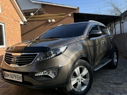 Коричневый Киа Sportage, объемом двигателя 2 л и пробегом 190 тыс. км за 12700 $, фото 1 на Automoto.ua