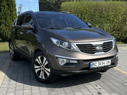 Коричневий Кіа Sportage, об'ємом двигуна 2 л та пробігом 130 тис. км за 13300 $, фото 1 на Automoto.ua