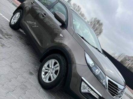 Коричневий Кіа Sportage, об'ємом двигуна 2 л та пробігом 156 тис. км за 10999 $, фото 1 на Automoto.ua