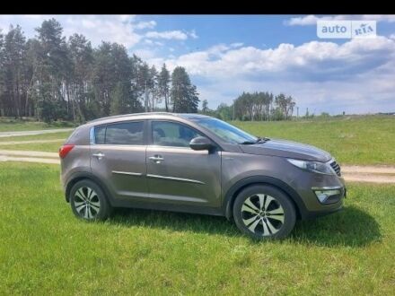 Коричневый Киа Sportage, объемом двигателя 2 л и пробегом 175 тыс. км за 15000 $, фото 1 на Automoto.ua