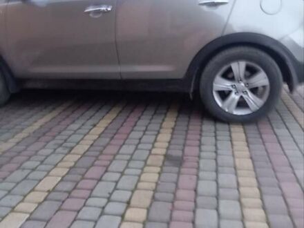 Коричневый Киа Sportage, объемом двигателя 2 л и пробегом 255 тыс. км за 12300 $, фото 1 на Automoto.ua