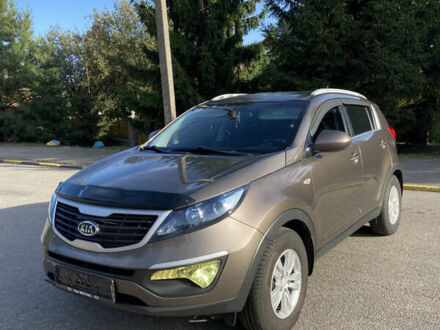 Коричневий Кіа Sportage, об'ємом двигуна 2 л та пробігом 173 тис. км за 11666 $, фото 1 на Automoto.ua