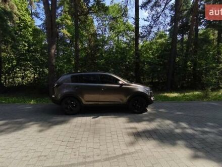 Коричневый Киа Sportage, объемом двигателя 2 л и пробегом 150 тыс. км за 16500 $, фото 1 на Automoto.ua