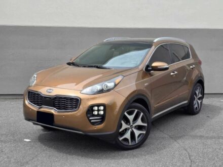 Коричневий Кіа Sportage, об'ємом двигуна 2 л та пробігом 64 тис. км за 12700 $, фото 1 на Automoto.ua