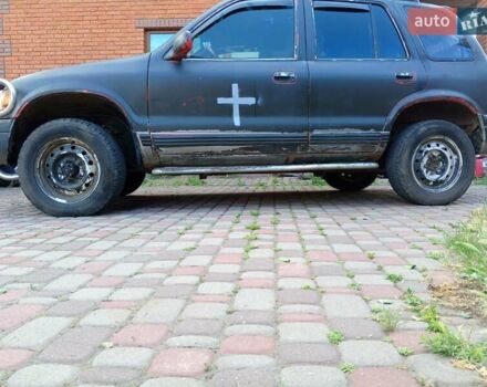 Красный Киа Sportage, объемом двигателя 2 л и пробегом 309 тыс. км за 3300 $, фото 3 на Automoto.ua