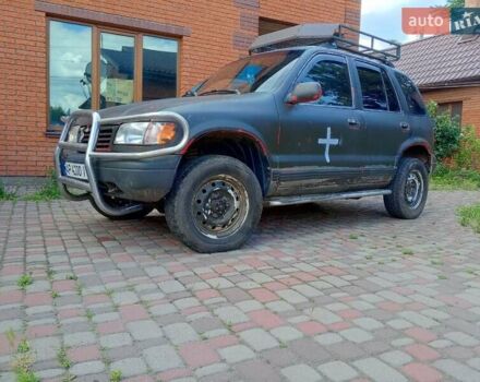 Красный Киа Sportage, объемом двигателя 2 л и пробегом 309 тыс. км за 3300 $, фото 2 на Automoto.ua