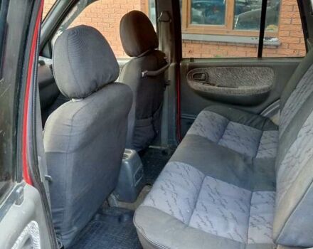 Красный Киа Sportage, объемом двигателя 2 л и пробегом 309 тыс. км за 3300 $, фото 8 на Automoto.ua