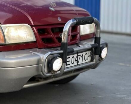 Красный Киа Sportage, объемом двигателя 2 л и пробегом 350 тыс. км за 2999 $, фото 6 на Automoto.ua