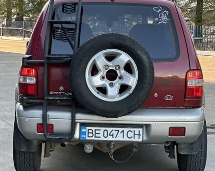Красный Киа Sportage, объемом двигателя 2 л и пробегом 350 тыс. км за 2999 $, фото 2 на Automoto.ua