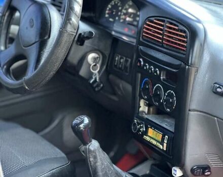 Красный Киа Sportage, объемом двигателя 2 л и пробегом 350 тыс. км за 2999 $, фото 14 на Automoto.ua