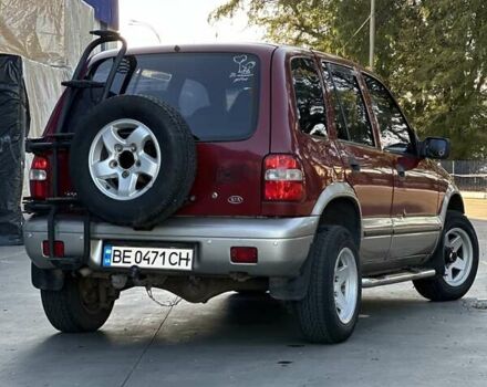 Красный Киа Sportage, объемом двигателя 2 л и пробегом 350 тыс. км за 2999 $, фото 3 на Automoto.ua