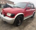 Красный Киа Sportage, объемом двигателя 2 л и пробегом 256 тыс. км за 3000 $, фото 1 на Automoto.ua