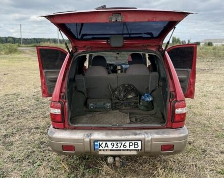 Красный Киа Sportage, объемом двигателя 2 л и пробегом 276 тыс. км за 3600 $, фото 15 на Automoto.ua