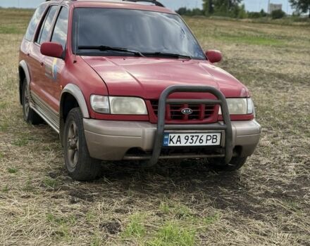 Красный Киа Sportage, объемом двигателя 2 л и пробегом 276 тыс. км за 3600 $, фото 2 на Automoto.ua