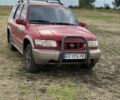 Красный Киа Sportage, объемом двигателя 2 л и пробегом 276 тыс. км за 3600 $, фото 2 на Automoto.ua