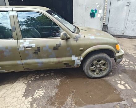 Красный Киа Sportage, объемом двигателя 2 л и пробегом 200 тыс. км за 1500 $, фото 2 на Automoto.ua