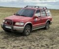 Красный Киа Sportage, объемом двигателя 2 л и пробегом 276 тыс. км за 3600 $, фото 1 на Automoto.ua