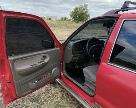 Красный Киа Sportage, объемом двигателя 2 л и пробегом 276 тыс. км за 3600 $, фото 5 на Automoto.ua
