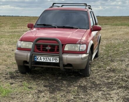 Красный Киа Sportage, объемом двигателя 2 л и пробегом 276 тыс. км за 3600 $, фото 1 на Automoto.ua