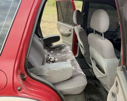 Красный Киа Sportage, объемом двигателя 2 л и пробегом 276 тыс. км за 3600 $, фото 13 на Automoto.ua