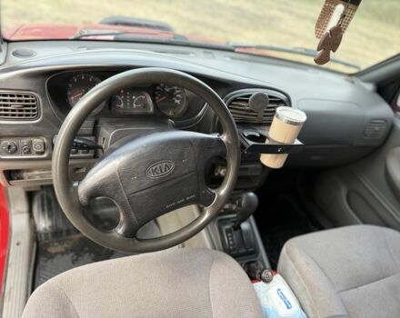 Красный Киа Sportage, объемом двигателя 2 л и пробегом 276 тыс. км за 3600 $, фото 6 на Automoto.ua